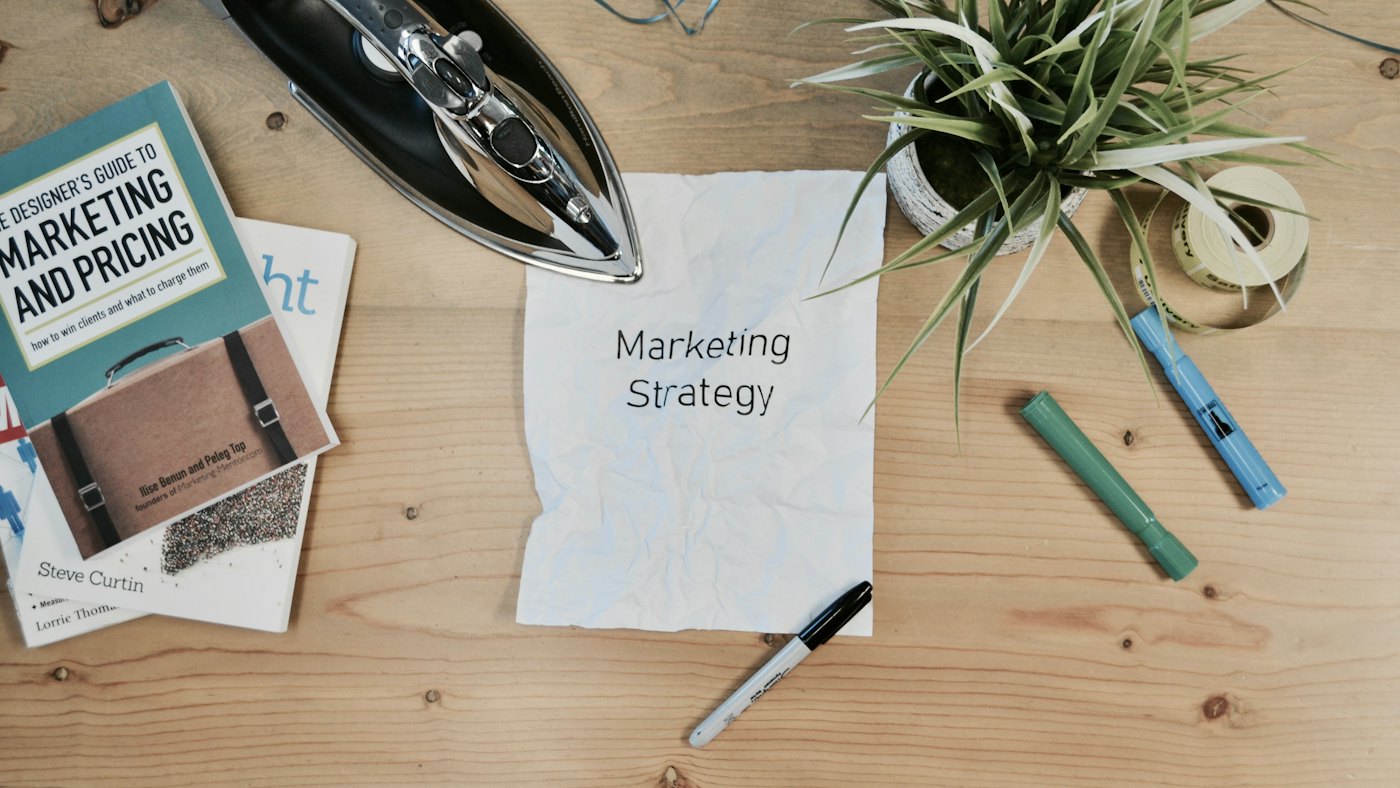 Startup team planning a digital marketing strategy on a whiteboard